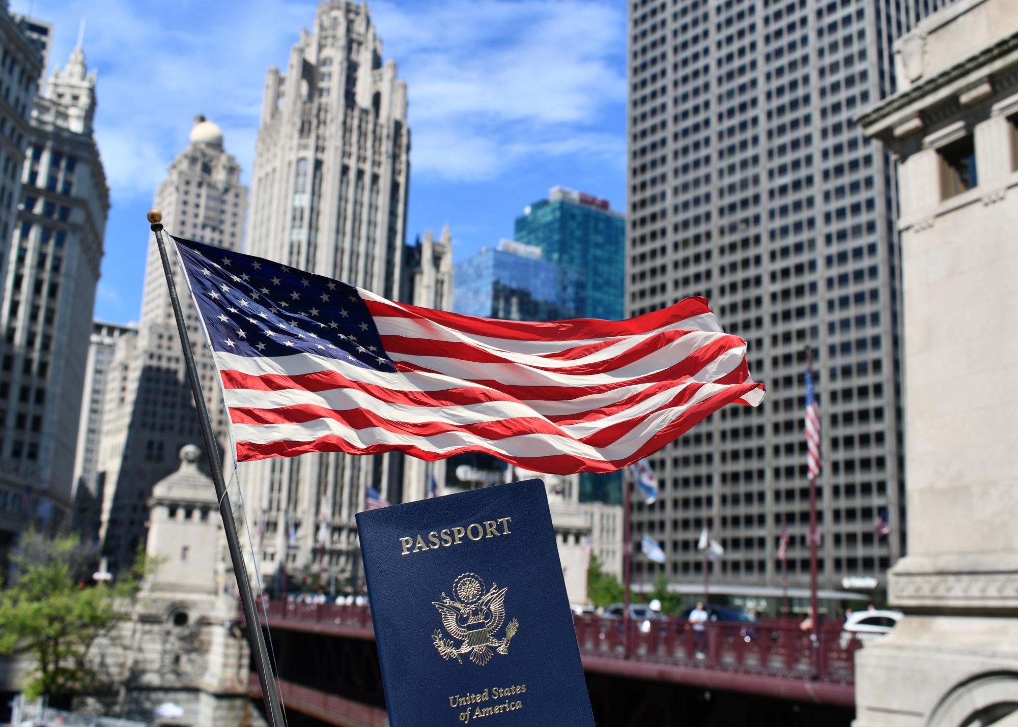 A person happily holding their new passport